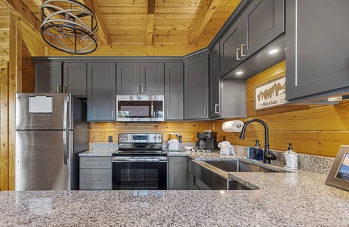 Sevierville Cabin | Waterfall, Hot Tub, Fire Pit + 20 Mile View