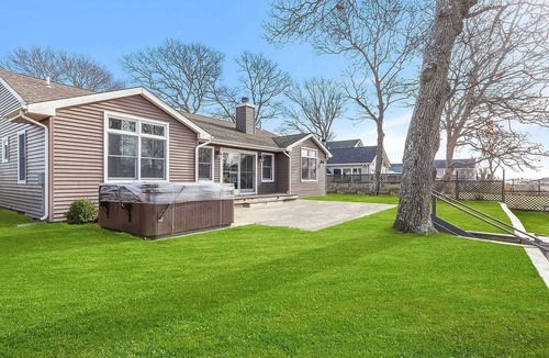East Quogue House | Waterfront 3BR, 10 Min to U.S. Open, Deck + Hot Tub