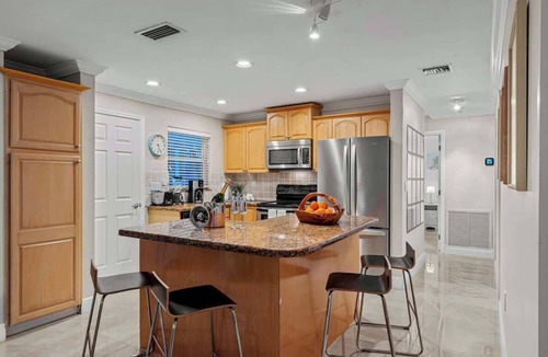 Garden Isles Villa | Waterfront 3BR Home w/Heated Pool & Kayaks
