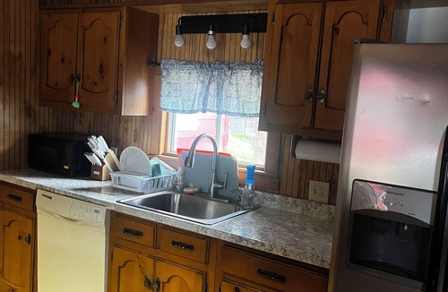 Charlton House | Waterfront 4-bedroom camp-style house in Charlton. Packed with fun for anyone!