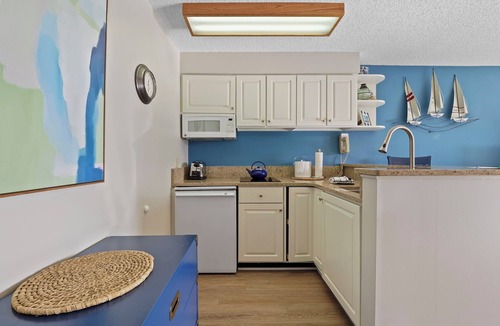 Charlevoix Condo | Waterfront Access | Pool, Hot Tub, Sauna | Sleeps 4