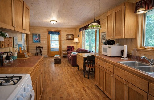 Indian River House | Waterfront Burt Lake Cottage | Sleeps 6