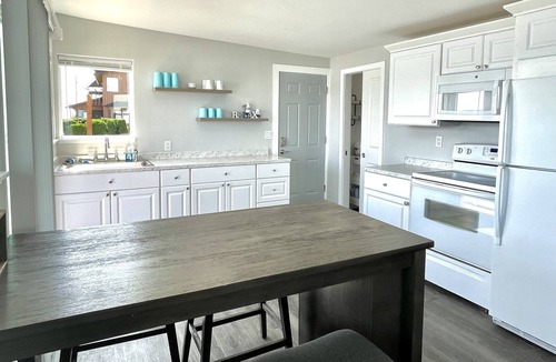 Camano Island Cottage | Waterfront Cabin on Camano Island with hot tub and outdoor patio.