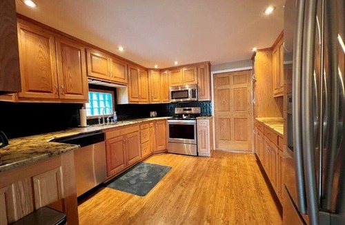 Russells Point Cottage | Waterfront Cabin: Hot Tub, Game Room & Fire Pit