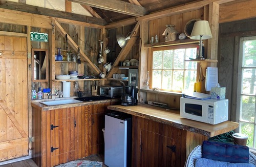 Bernard Cabin | Waterfront Cabin with Private Dock and Cobblestone Beach