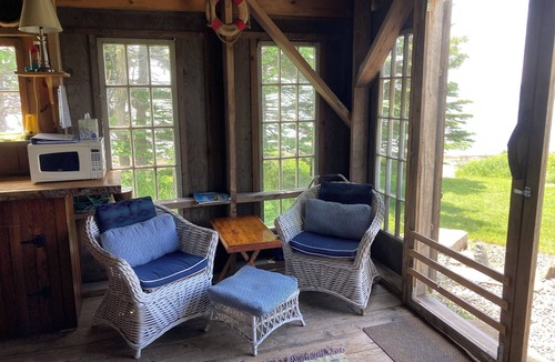 Bernard Cabin | Waterfront Cabin with Private Dock and Cobblestone Beach