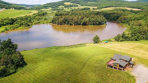 Stamford Ski Chalet | Waterfront Catskills Log Cabin with Hot Tub & Views
