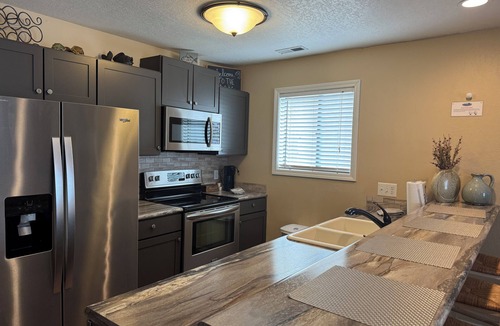 Osage Beach Condo | Waterfront Condo! Great Location with an incredible view! Boat Slip Available!