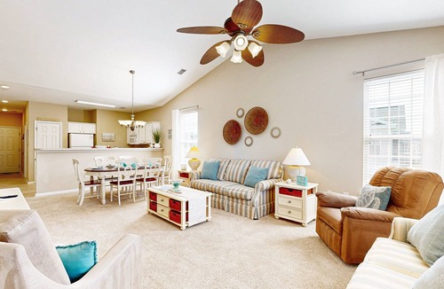 Sunset Beach Condo | Waterfront condo with pool, tennis, bikes & lagoon/golf views - near the beach