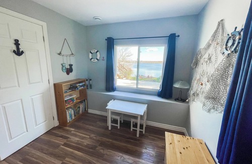 Greater Napanee Cottage | Waterfront Cottage with Hot Tub, Sauna, Fire Pit! Very family-friendly!