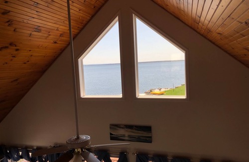 Three Mile Bay Cottage | Waterfront Cottage, Palm Tree Pointe, private space right on the water.