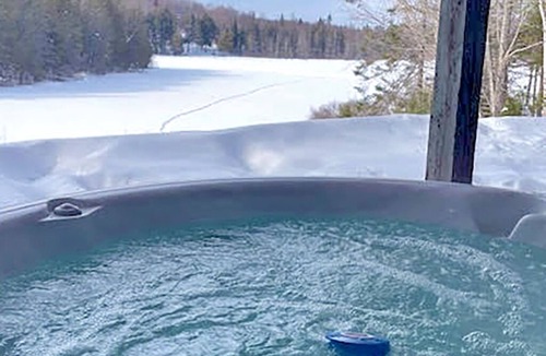Hastings Highlands Cottage | Waterfront Cottage with Hot Tub on 27 Acres - Sleeps 6. Dogs Welcome!