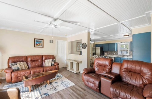 Alanson House | Waterfront Cottage with Covered Boat Slip
