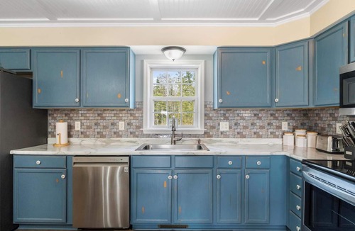 Alanson House | Waterfront Cottage with Covered Boat Slip