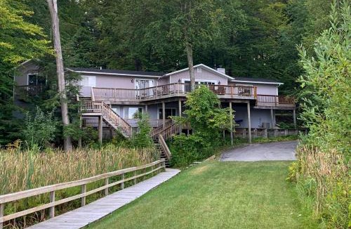 Rapid City House | Waterfront Deck and Dock Torch Lake Home!