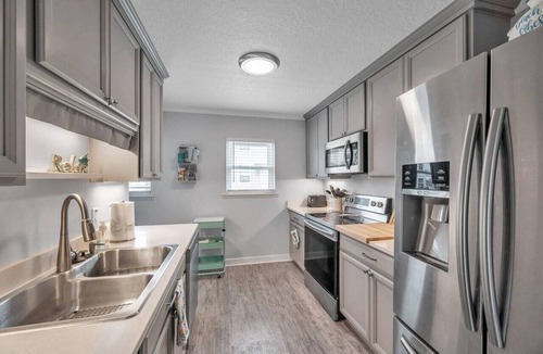 Indian Shores Villa | Waterfront End Unit Townhome with Garage(SS-23)