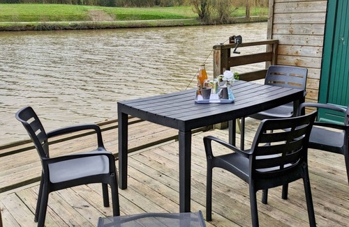 Villiers-Charlemagne Cottage | Waterfront Chalet with Private Fishing, Terrace, and Games, Sleeps 5-7
