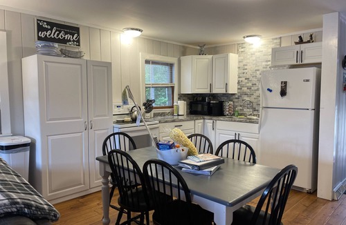 East Wakefield House | Waterfront! Gentle sloping beach highlights this updated waterfront home!