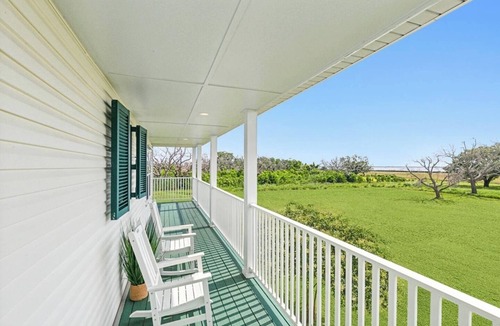 Lafitte House | Waterfront Getaway Balcony + Bayou Views