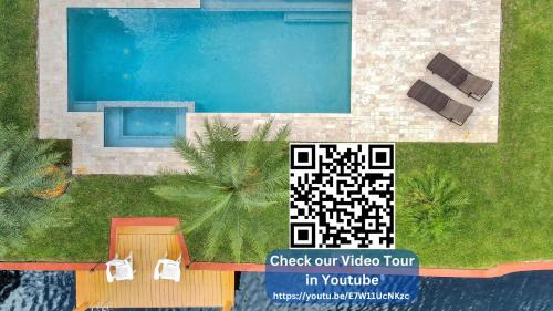 North Corals House | Waterfront Heated Pool(Complimentary), Jacuzzi, Pier, 2mi to Beach