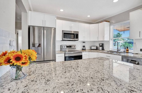 North Corals House | Waterfront Heated Pool, Jacuzzi, Private Pier, 2mi to Beach