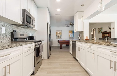 Garden Isles House | Waterfront Heated Pool + SUPs - 5BR Fun Stay!