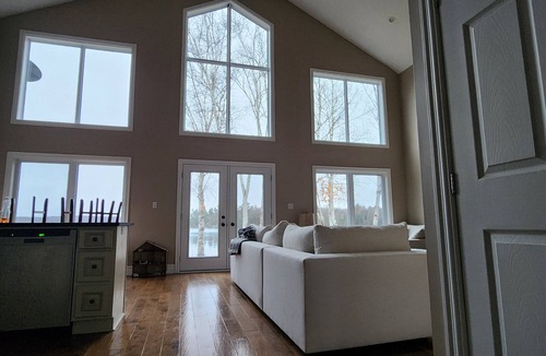 Ryerson House | Waterfront home on stunning lake Cecebe luxury cathedral ceilings cozy fireplace