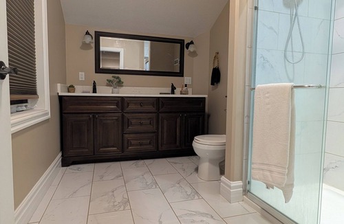 Ryerson House | Waterfront home on stunning lake Cecebe luxury cathedral ceilings cozy fireplace