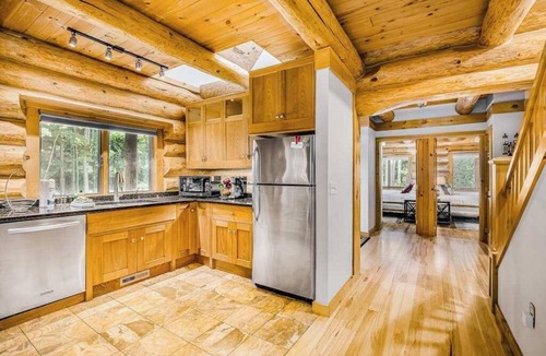 Thompsonville House | Waterfront home on Betsie River with hot tub & sauna near skiing at Crystal Mtn