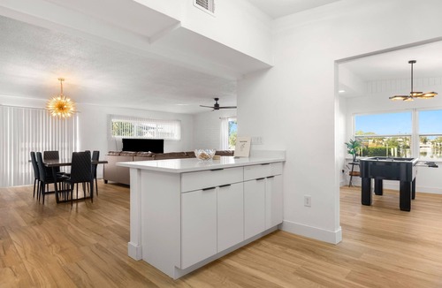 Apollo Beach House | Waterfront Home -Private Dock,Pool,Hot Tub,cold plunge, Kayaks, Paddleboards,
