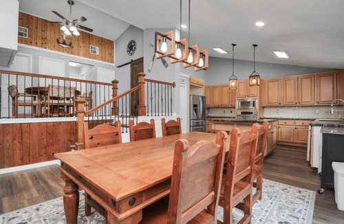 Montgomery House | Waterfront house with a large deck and dock for boat or fishing