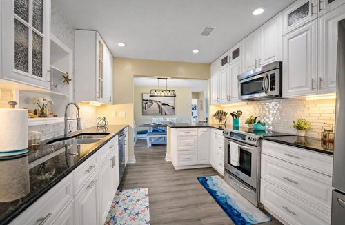 Tropic Palms House | Waterfront Htd Pool, Spa, Billiards, Lanai, Canal