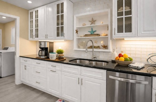 Tropic Palms House | Waterfront Htd Pool, Spa, Billiards, Lanai, Canal