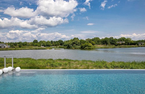 Little Silver House | Waterfront, infinity edge pool and 3 miles to the beach!