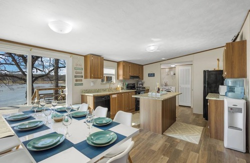Seven Points House | Waterfront Lake Cottage, Spacious Outdoor Deck & Dock! Dog friendly firepit &BBQ