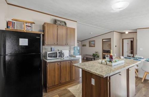 Seven Points House | Waterfront Lake Cottage, Spacious Outdoor Deck & Dock! Dog friendly firepit &BBQ