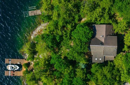 Putnam Station House | Waterfront Lake George Lodge with Boat Dock and Deck!