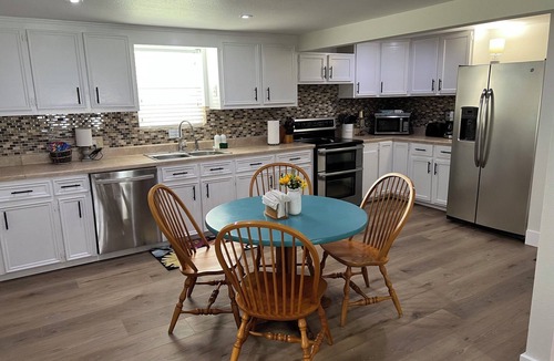 West Livingston House | Waterfront Lake House with Fishing Dock, Peaceful Deck and Spectacular Sunsets
