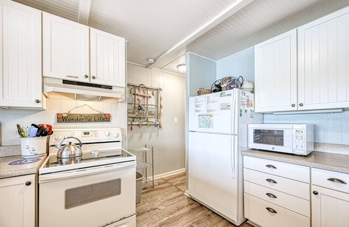 Moneta Cottage | Waterfront lake-view home with dock, fireplace, pool table, kayaks, & firepit