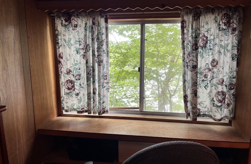 Colton House | Waterfront Location. Panoramic Views. Cozy Comforts. Treehouse Tranquility.