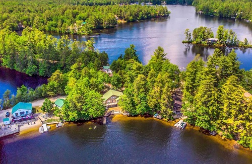 East Wakefield Cabin | Waterfront Log Cabin w/ Hot Tub & Fire Pit!