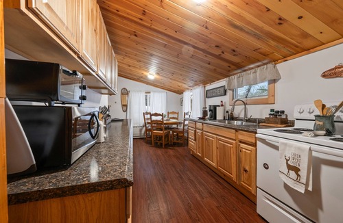 Magalloway Plantation Cabin | Waterfront Maine Cabin w/Deck, Fire Pit & Trails