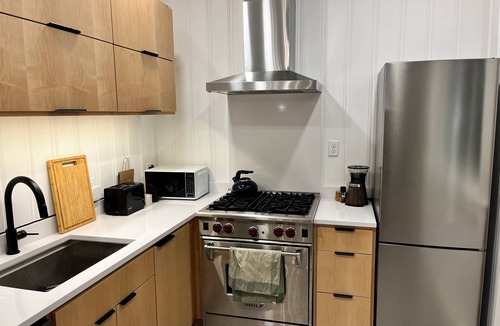 Brighton Cottage | Waterfront mid-century modern