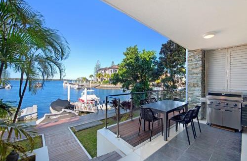 Runaway Bay Apartment | Waterfront Oasis in Runaway Bay - CoastHM