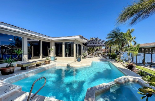 Cocoa Isles House | Waterfront Oasis - King Beds 10min Walk to Beach