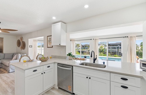 Apollo Beach House | WaterFront Oasis with Saltwater Pool & Dock