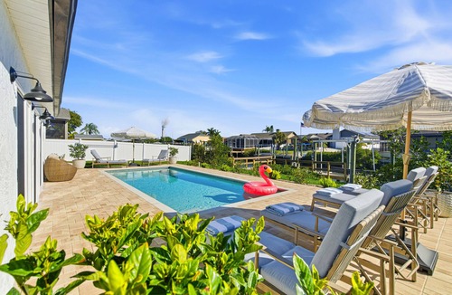 Apollo Beach House | WaterFront Oasis with Saltwater Pool & Dock