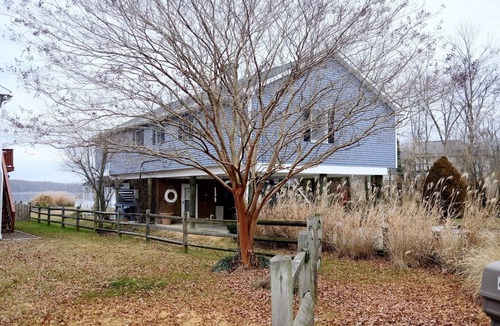 Magnolia House | Waterfront Oasis w/Private Dock, Firepit, Arcade & Sunset Views