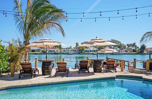 Indian Rocks Beach House | Waterfront Pirate House with Pool & 2 Golf Carts