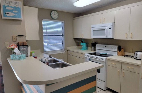 Corpus Christi Condo | Waterfront Paradise has a Reserved Boat Slip, Overlooks the Pool & the Canal